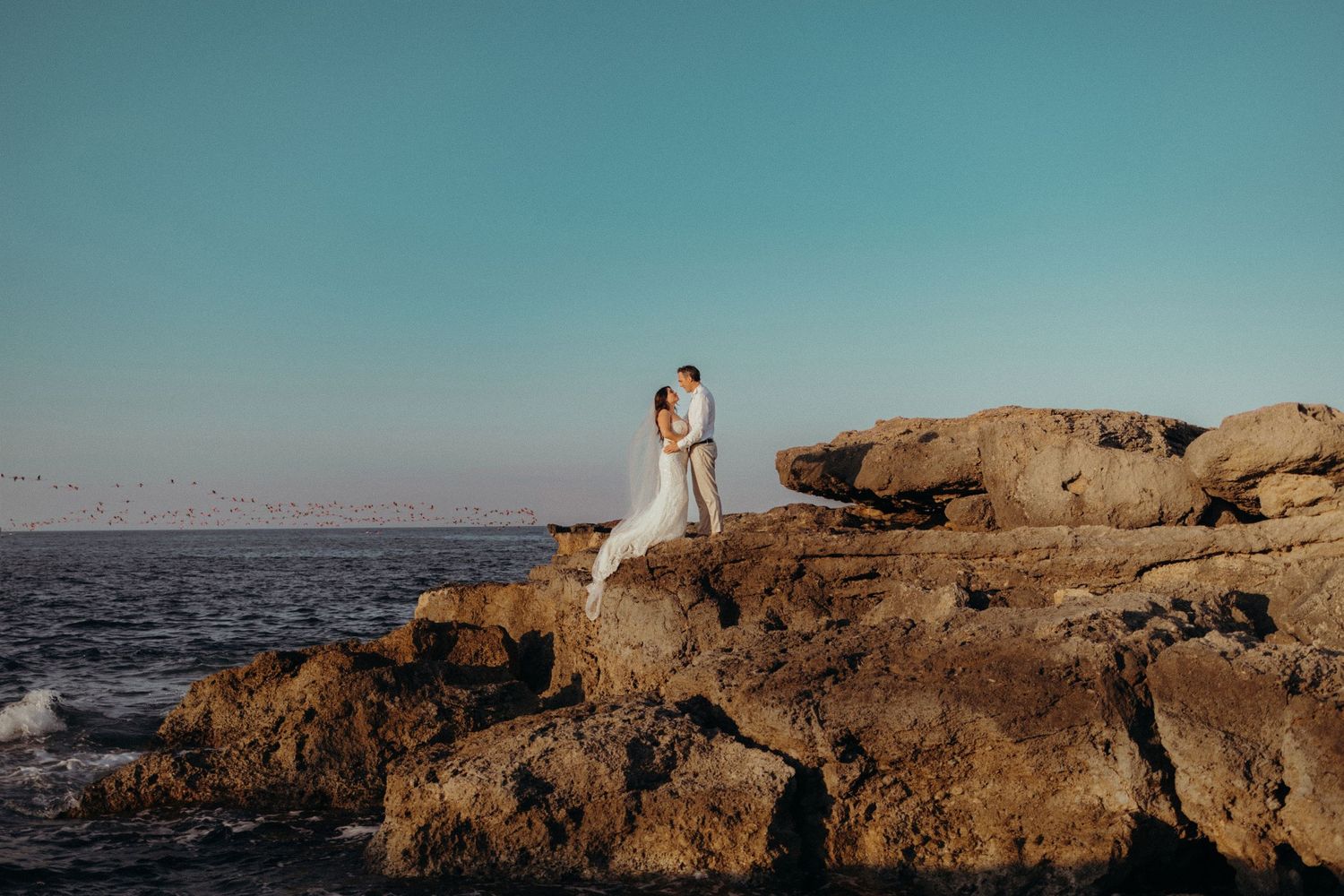 Elegant venue in a Mediterranean garden setting at twilight