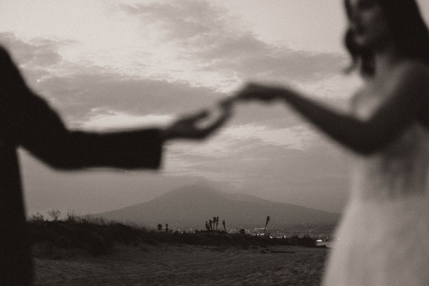 Romantic close-up of wedding ring with Mediterranean coast backdrop