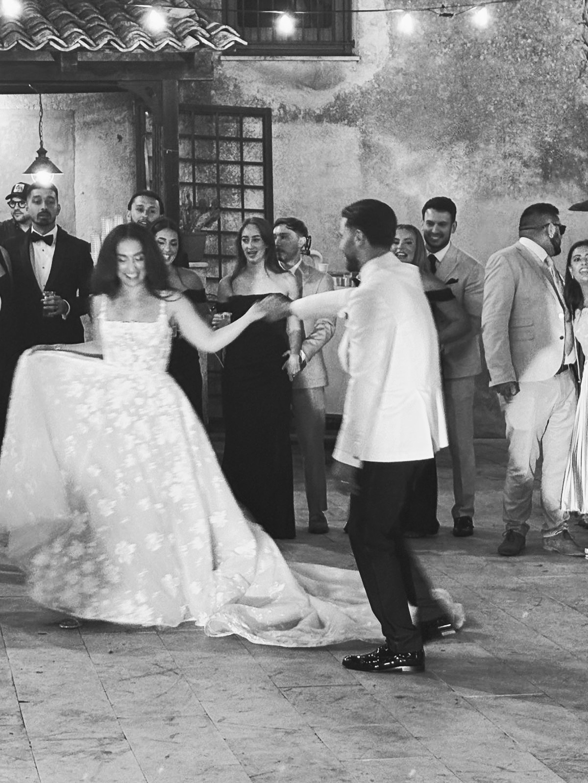 Black and white photograph of the couple’s first dance