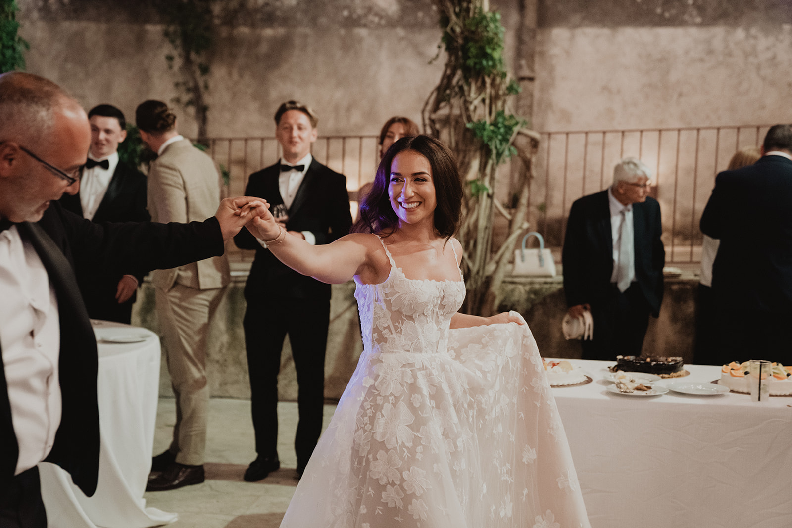 Bride twirling in the courtyard of a historic palazzo